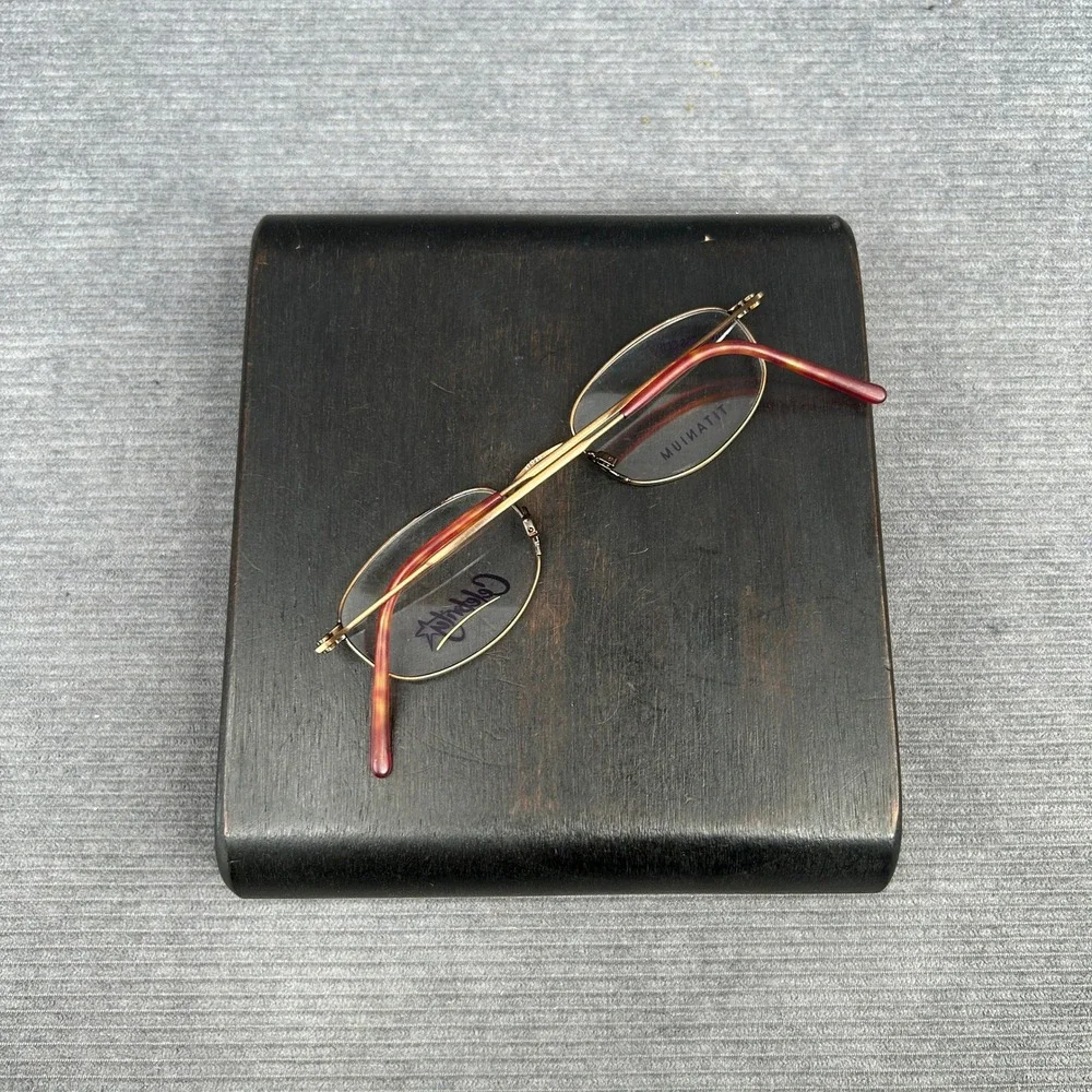 Celebrity by Altair Eyewear Titanium Antique Brown Demi Oval Eyeglass Frames 145